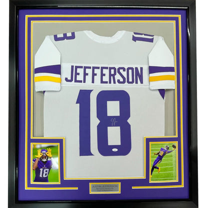 Framed Justin Jefferson Vikings jersey with autographs, photos, and nameplate display