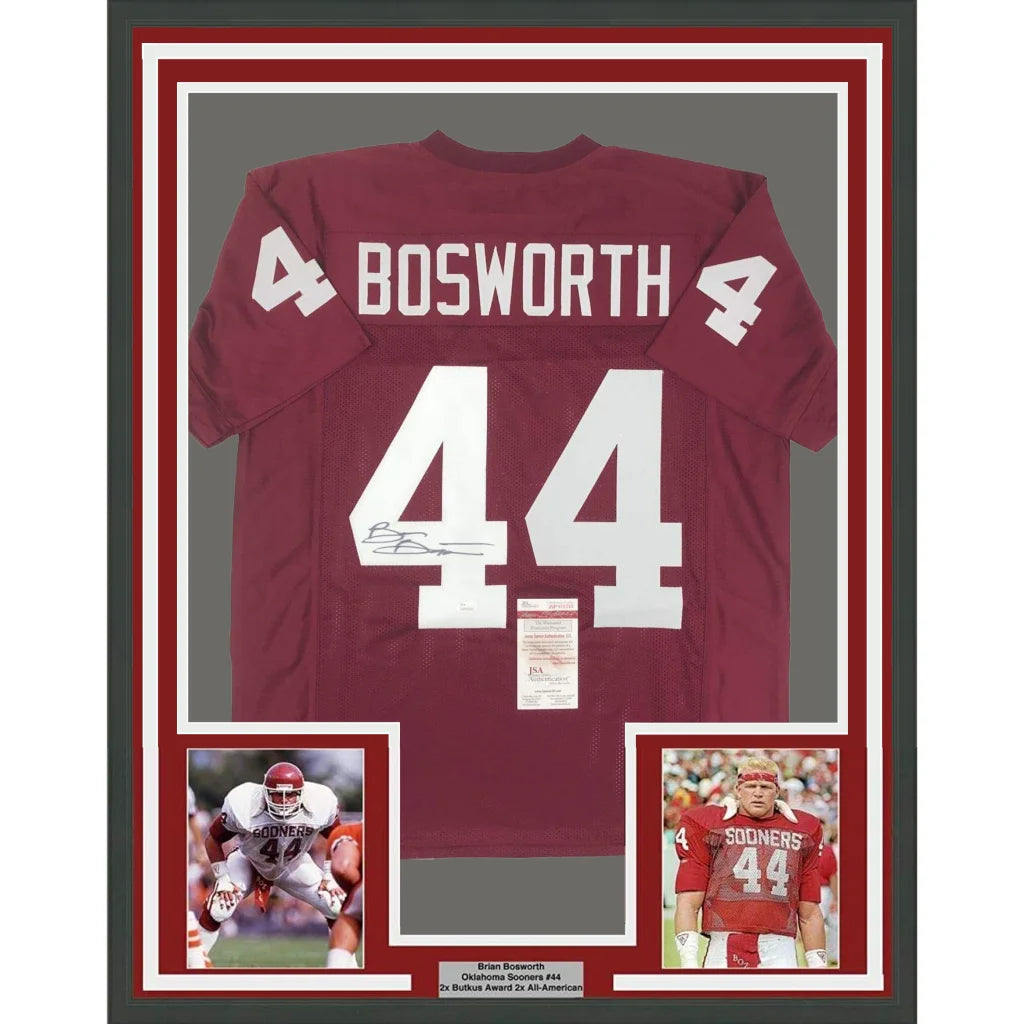 Framed maroon football jersey with white lettering, autograph, photos