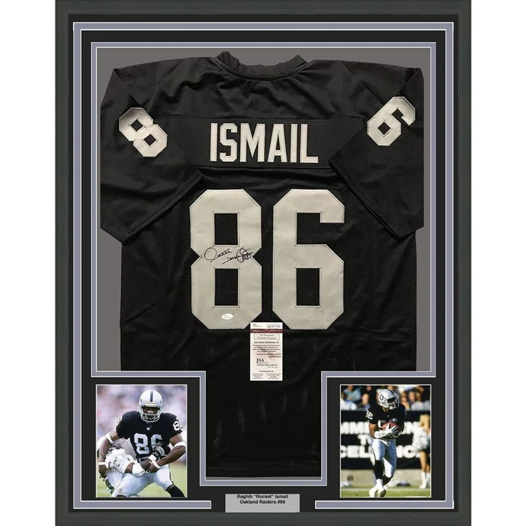 Framed black NFL jersey with autographs and player photos perfect for your man cave