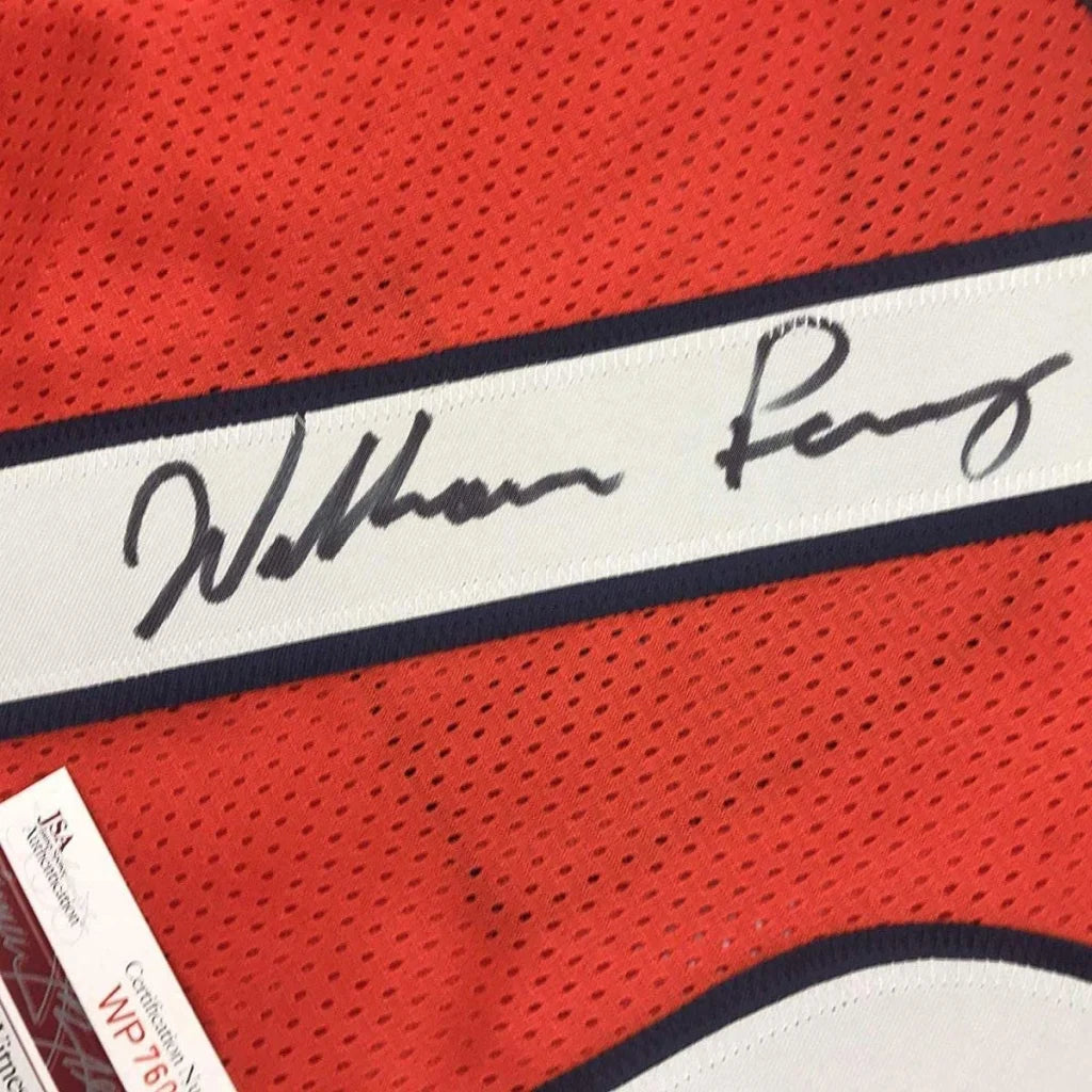 Framed red and white Perry 72 basketball jersey with autograph