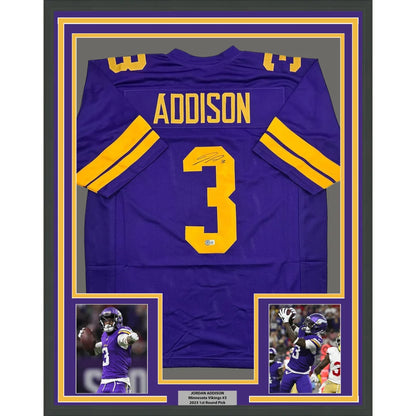 Framed purple Minnesota Vikings Addison jersey with autograph, action photos, and plaque