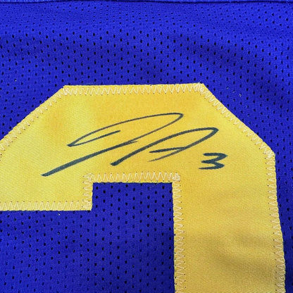 Purple mesh Vikings Addison jersey with yellow number and black autograph for sale