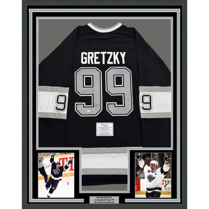 Framed autographed Wayne Gretzky Los Angeles Kings jersey with commemorative photos