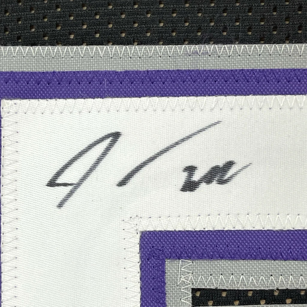 White fabric patch with black signature and purple gray trim on Framed Williams 55 Jersey