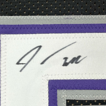 White fabric patch with black signature and purple gray trim on Framed Williams 55 Jersey