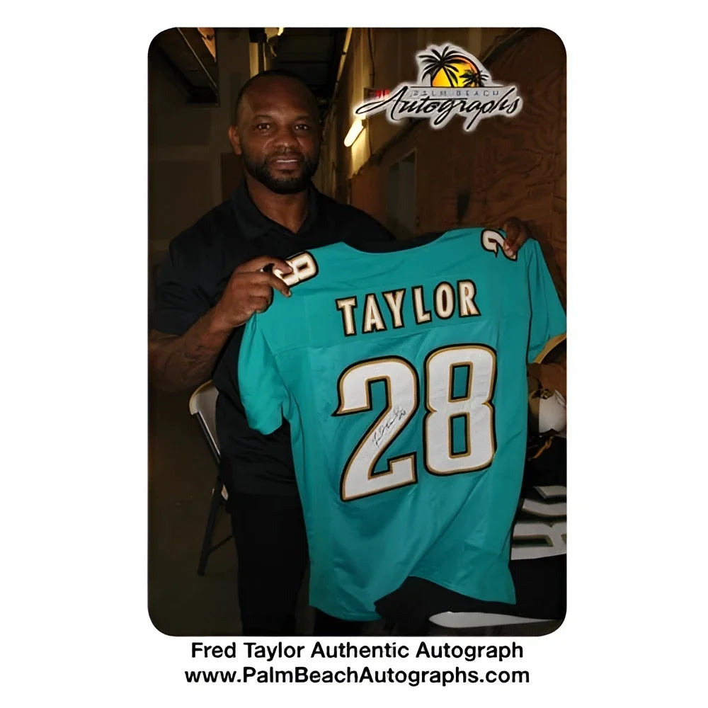Fred Taylor autographed deluxe framed Jacksonville Jaguars teal jersey with Taylor name