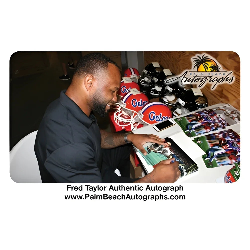 Fred Taylor autographed Florida Gators 8x10 photo with helmet