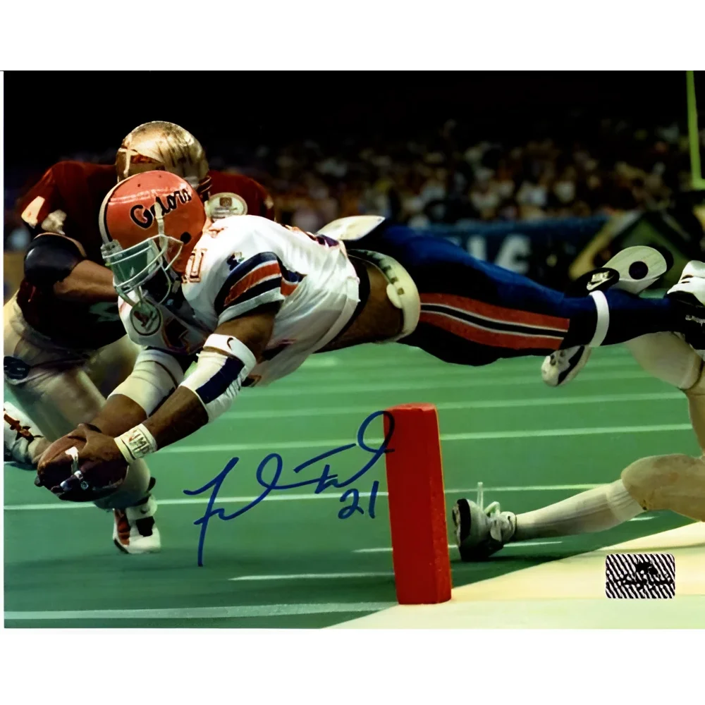 Fred Taylor autographed Florida Gators 8x10 photo of orange helmeted player diving for touchdown