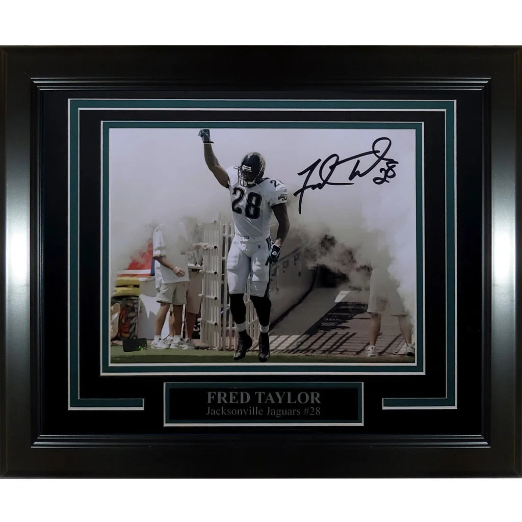 Autographed black framed 8x10 photo of Jaguars legend Fred Taylor #28