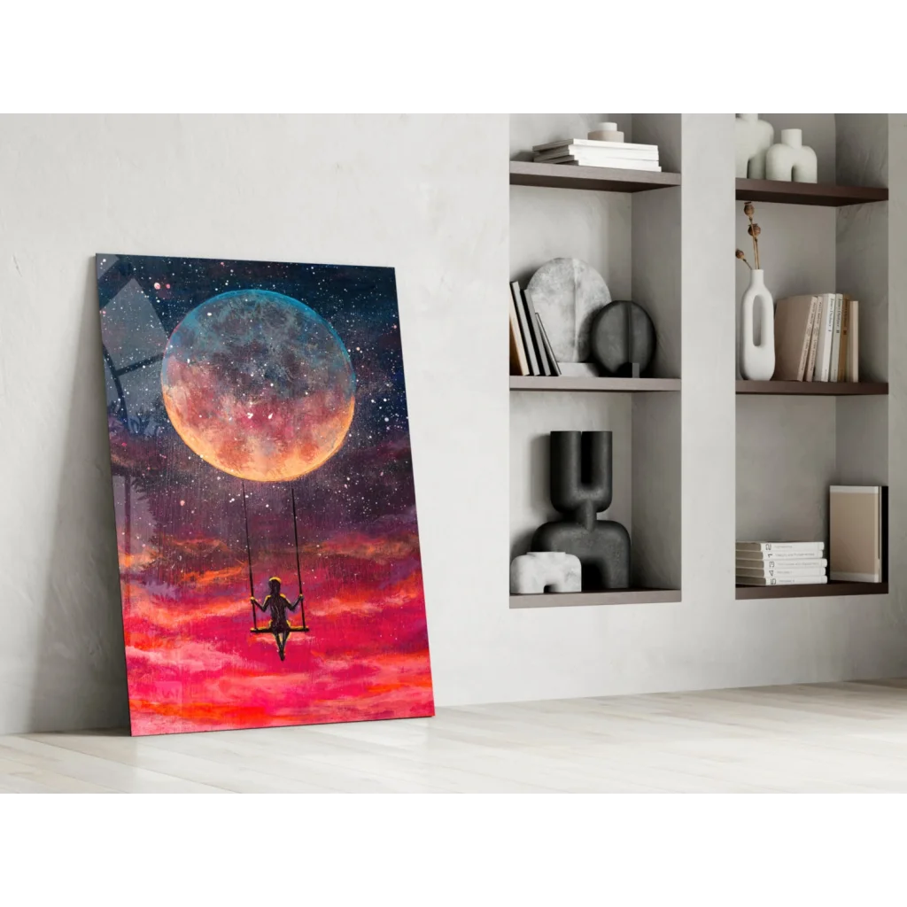 Vibrant glass wall art of swing silhouette under colorful moon and starry sky