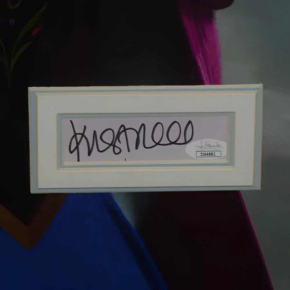 Signed Frozen movie poster by Idina Menzel in white frame