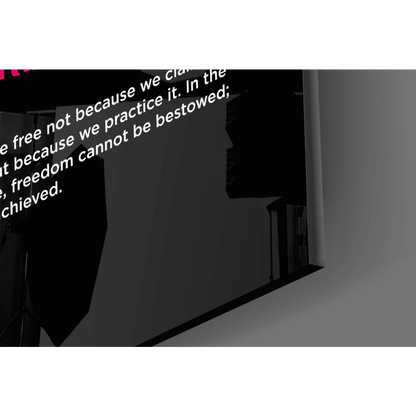 Black digital display on stunning glass wall art with white text and pink accent