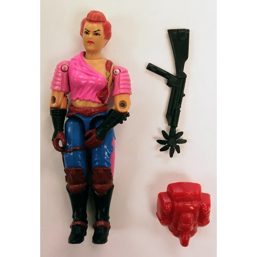 Zarana action figure from 1986 GI Joe Cobra with pink blue outfit and green gun
