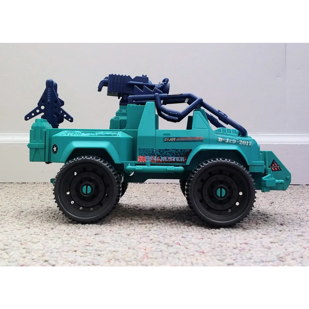 Vintage 1993 GI Joe Vehicle Mudbuster teal black toy with rugged design large wheels mounted weapon