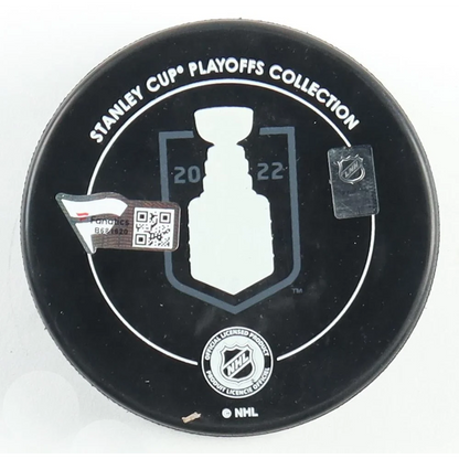 Black hockey puck with Stanley Cup logo and 2022, Gabriel Landeskog signed Avalanche Stanley Cup