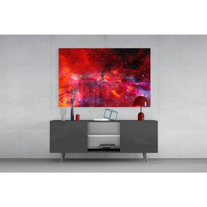 Vibrant red pink cosmic nebula glass wall art with swirling sparkling stars