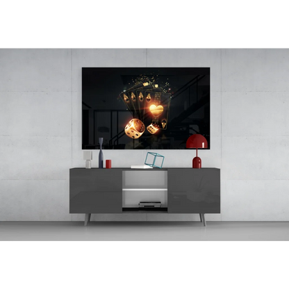 Glossy black glass wall art with glowing golden casino cards and dice