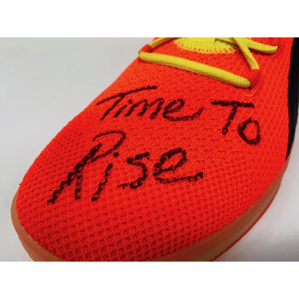 Orange knit shoe with yellow laces from Game Day Legends Deandre Ayton signed Puma Clyde