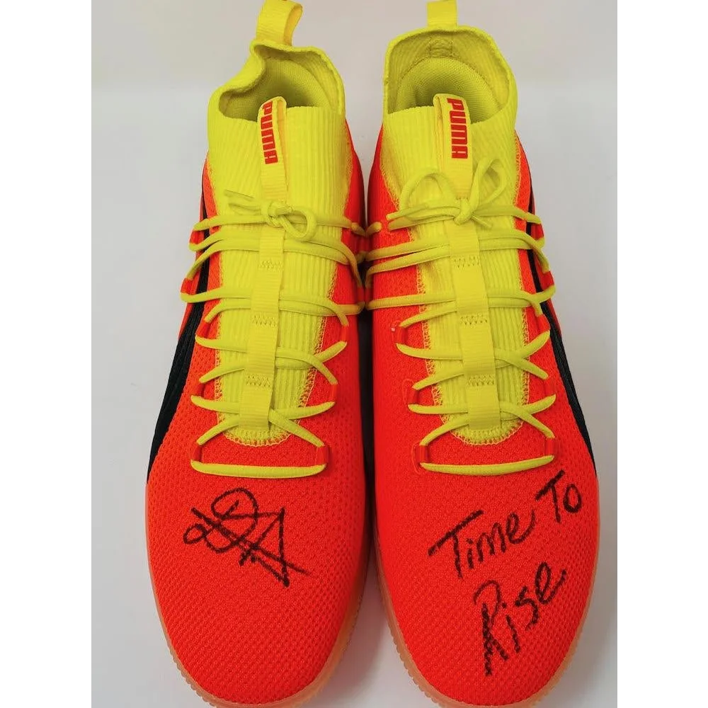 Orange and yellow Puma sneakers from Game Day Legends Deandre Ayton collection