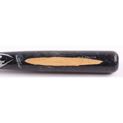 Black Louisville Slugger baseball bat with natural wood grain signed by Jonny Gomes