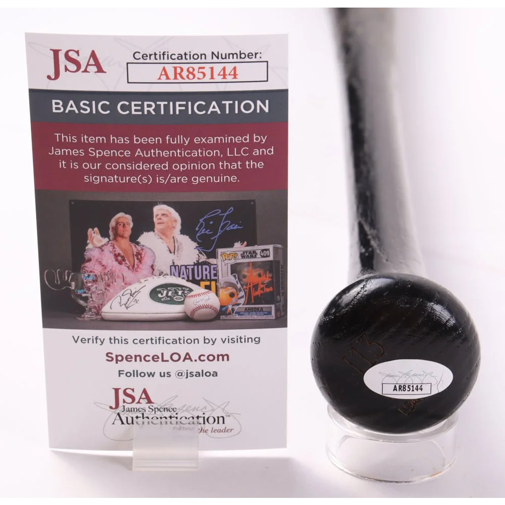 Black Louisville Slugger baseball bat with Jonny Gomes signature and certification sticker