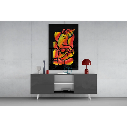 Vibrant orange and yellow Ganesha glass wall art on black canvas