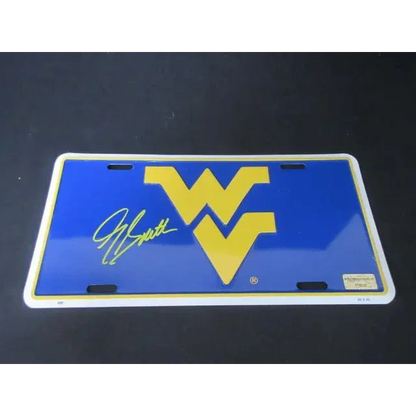 Blue and yellow West Virginia Mountaineers license plate with Geno Smith signed signature and COA