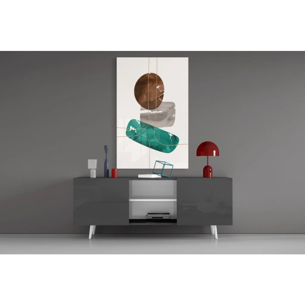 Modern glass wall art with gold accents, teal tones, and geometric bronze ovals on white