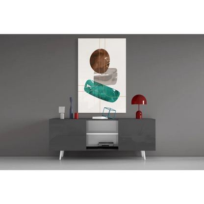 Modern glass wall art with gold accents, teal tones, and geometric bronze ovals on white