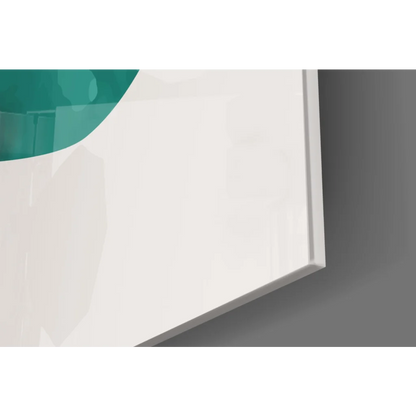 Modern teal circular glass wall art with gold accents in sleek frame