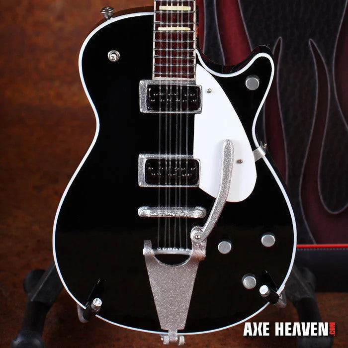 Black and white George Harrison Gretsch Duo Jet Signature mini guitar replica with silver hardware