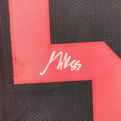 Black 49ers jersey with red number and white autograph from George Kittle
