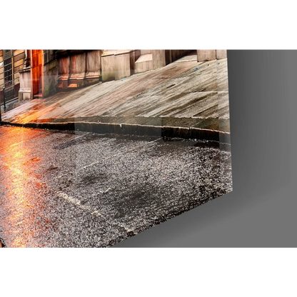 Sleek golden archway sunset glass wall art with wet urban reflections