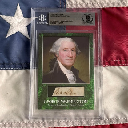 A green-bordered george washington letter trading card with authentic penmanship signature in a clear beckett slab