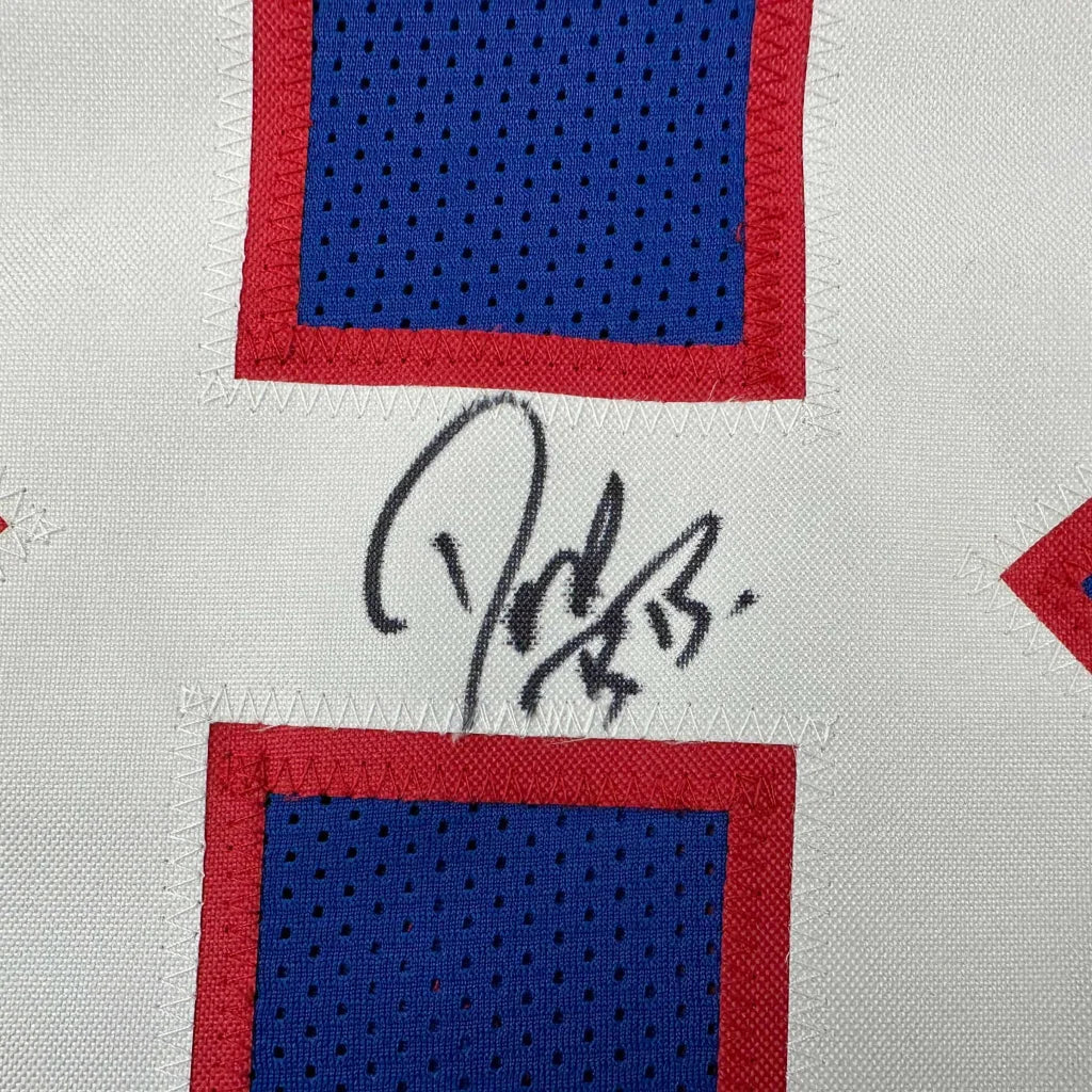 Autographed white custom jersey with blue and red accents from BEEBE 82 football collectible
