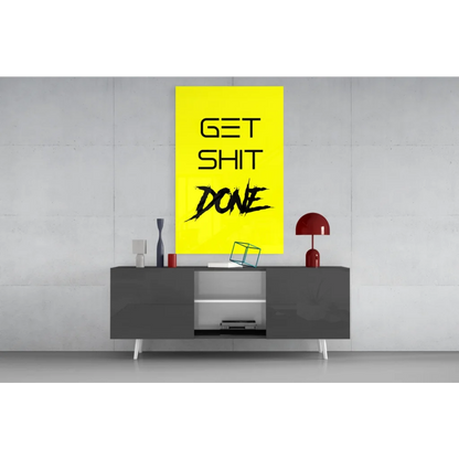 Get Shit Done yellow glass wall art with bold black text on rectangle