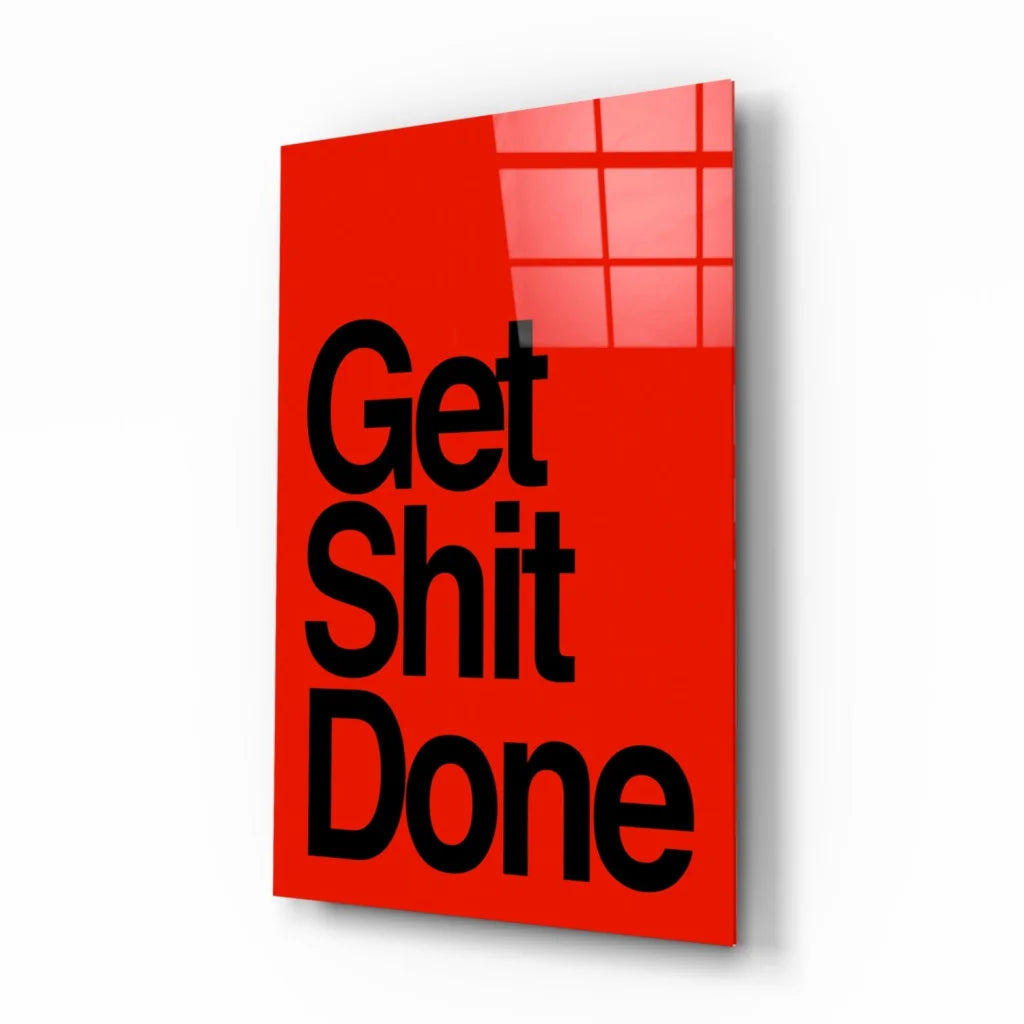 Vibrant red glossy glass wall art with bold black Get Shit Done text