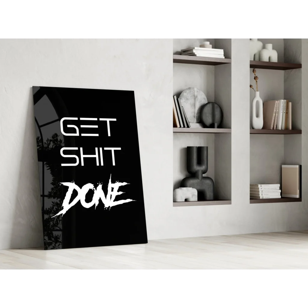 Bold white Get Shit Done text on black glossy glass wall art