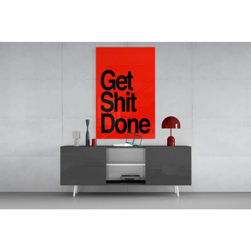 Vibrant red Get Shit Done glass wall art on minimalist wall