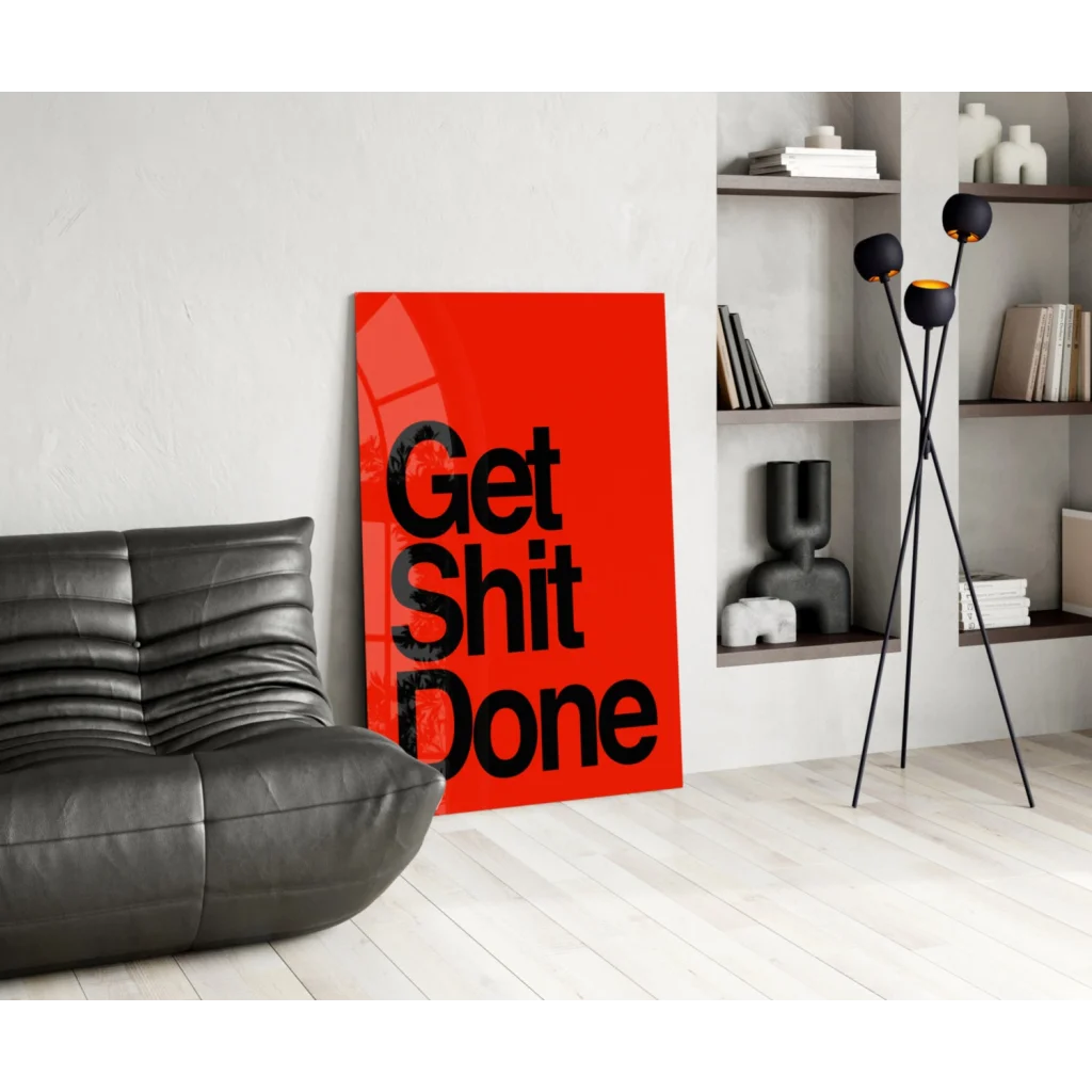 Vibrant red Get Shit Done glass wall art on minimalist white wall