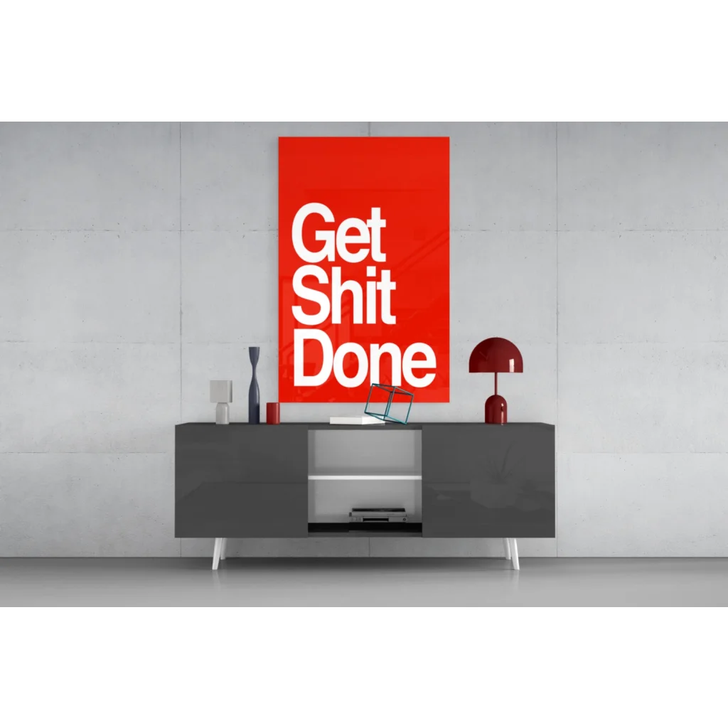 Vibrant red Get Shit Done glass wall art with bold white text