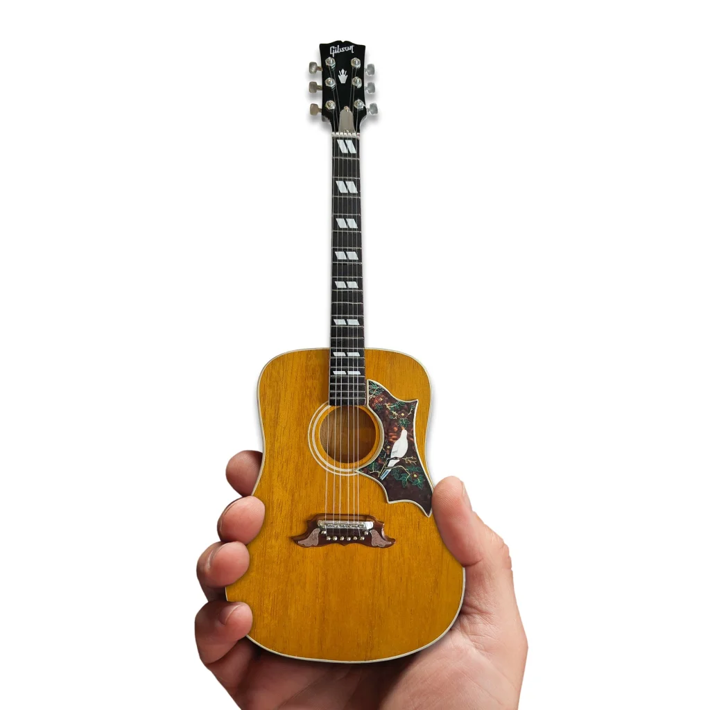 Mini Axe Heaven Gibson Dove guitar model with floral wood design