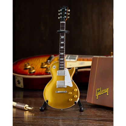 Gold Gibson Les Paul scale mini guitar collectible with black pickguard