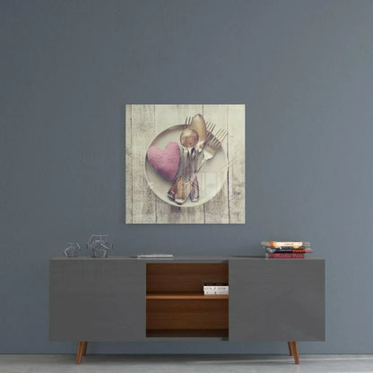 Rustic white plate with silverware and pink checkered heart wall art