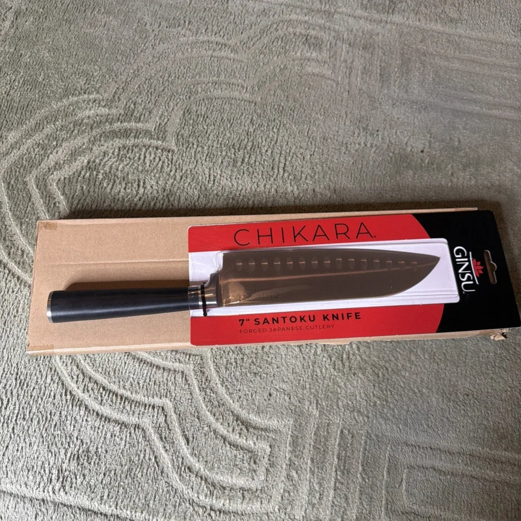 Ginsu Chikara Series 7-inch santoku knife with black handle