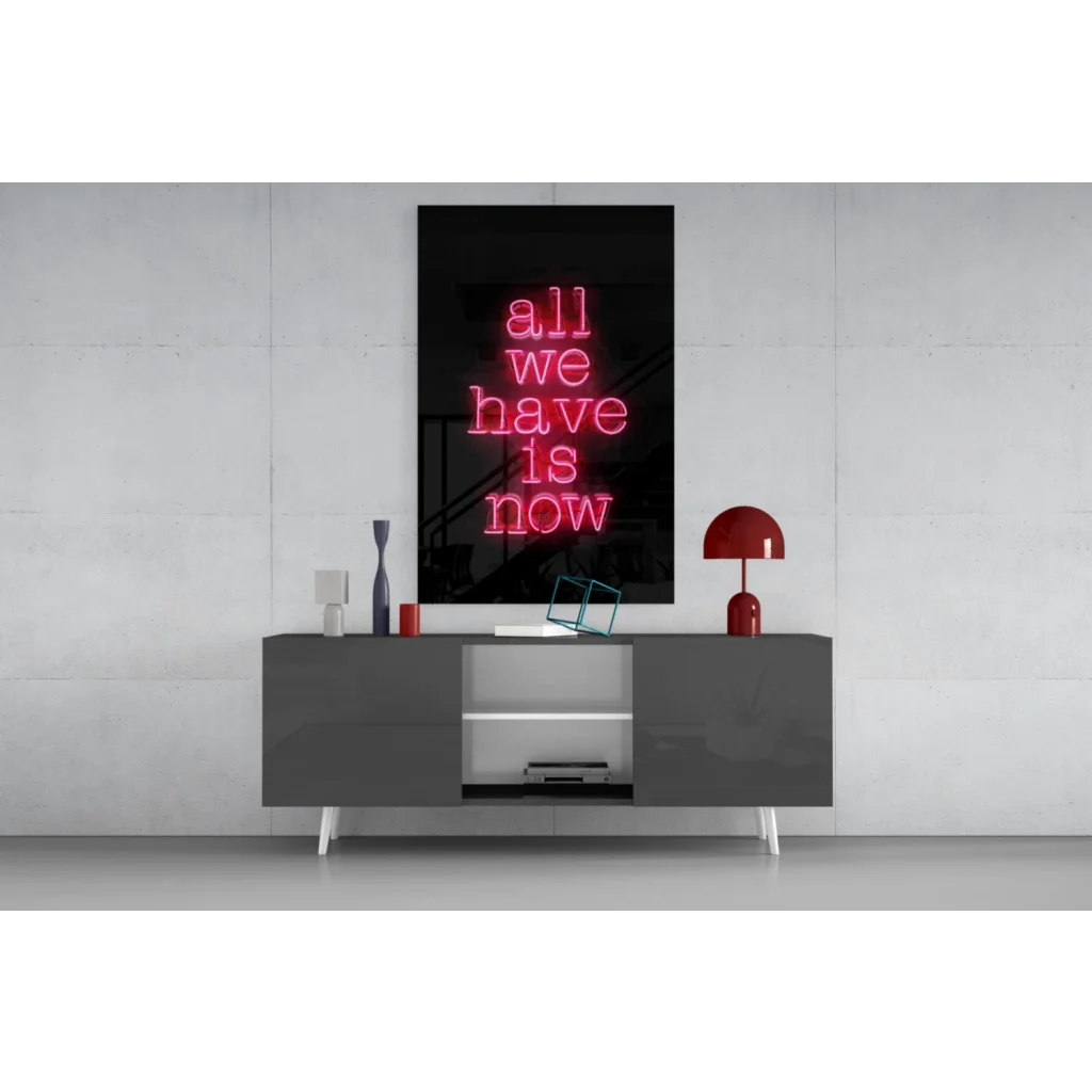 Glowing pink neon glass wall art sign reading all we have is now
