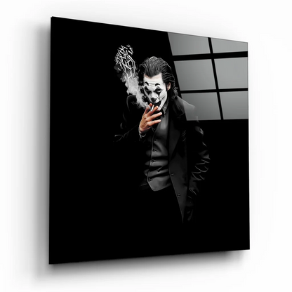 Joker in dark suit smoking on tempered glass art print with black frame