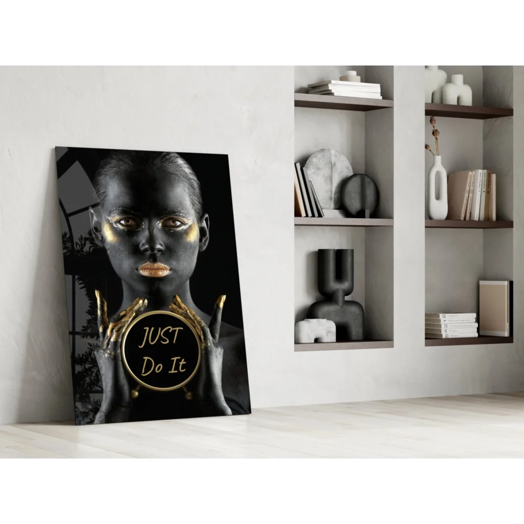 Golden motivational glass wall art with woman holding just do it emblem