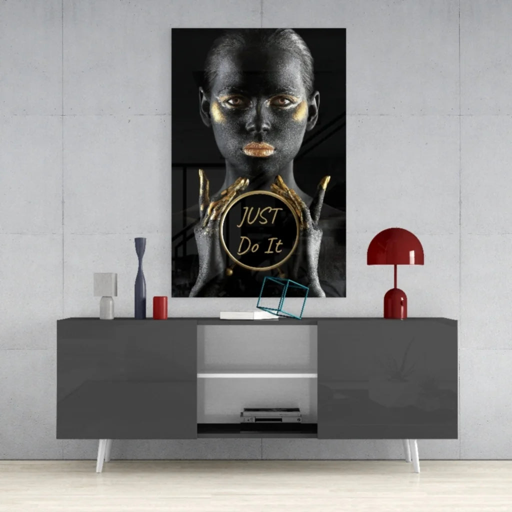 Golden motivational glass wall art with black and gold woman portrait framing just do it