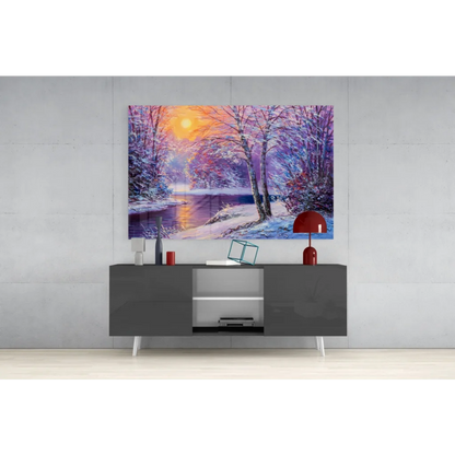 Vibrant winter sunset glass wall art with snow trees and river